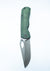 Dixon folding pocket knife with a frag textured green handle shown open against a plain white background