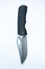 Dixon folding pocket knife with a frag textured black handle shown open against a plain white background