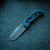 PM Mac 2 3.5" Skelly - a skeletonized version of the folding pocket knife with blue handle