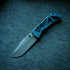 PM Mac 2 3.5" Skelly - a skeletonized version of the folding pocket knife with blue handle
