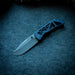PM Mac 2 3.5" Skelly - a skeletonized version of the folding pocket knife with purple handle